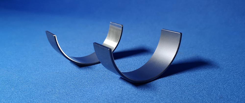 すべり軸受けへの二硫化モリブデンショット処理